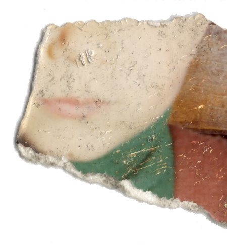 Visage d’enfant. Image déchirée. Fragment.